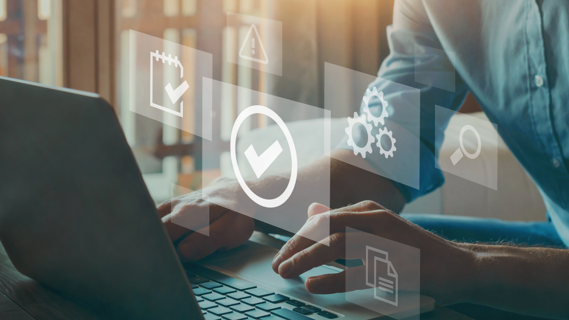 icons floating with laptop in background